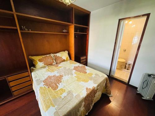 Ένα ή περισσότερα κρεβάτια σε δωμάτιο στο Apartamento na General Osório