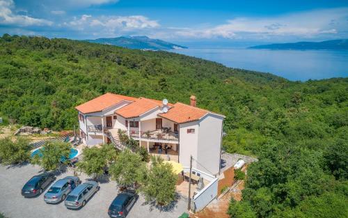 Family-friendly apartments with swimming pool Drenje, Labin - 23001