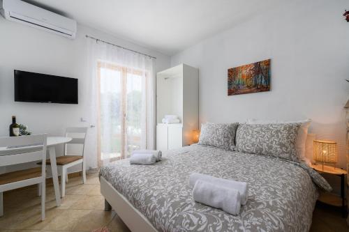 Family-friendly apartments with swimming pool Drenje, Labin - 23001