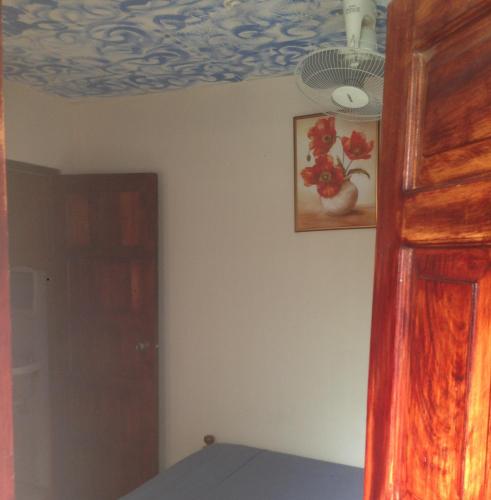 Ένα ή περισσότερα κρεβάτια σε δωμάτιο στο Hostal Brisas y Olas
