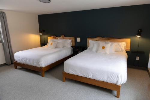 Ένα ή περισσότερα κρεβάτια σε δωμάτιο στο East Rock Inn