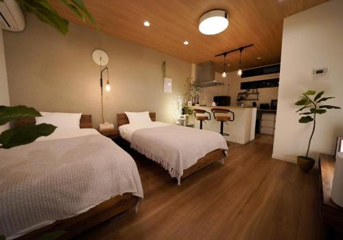 Ένα ή περισσότερα κρεβάτια σε δωμάτιο στο RGH ISHIUCHI BASE - Vacation STAY 15899