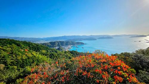 Bilde i galleriet til 夕日百選「すはら海岸」を望む限定一組の絶景宿。心地よいカフェ&カヤック体験で特別な一日を i Yuasa