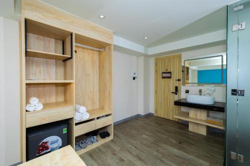 Ένα ή περισσότερα κρεβάτια σε δωμάτιο στο Khách sạn Phước Lộc Thọ 2 - 福禄寿