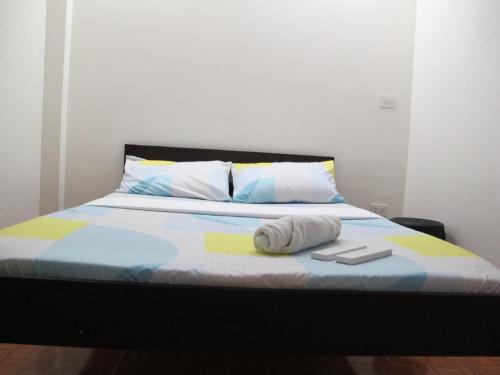 Ένα ή περισσότερα κρεβάτια σε δωμάτιο στο Leo Green Apartelle