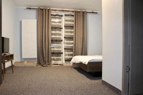 Postel nebo postele na pokoji v ubytování Complex Dalex