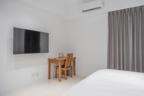 Televisyen dan/atau pusat hiburan di 隱月行旅民宿