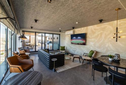 a living room with a couch and a table at Vacation Condo 1 bedroom in Tijuana