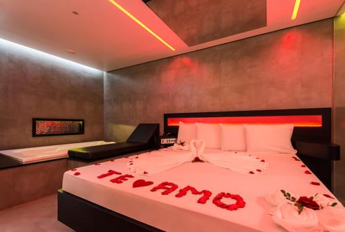Ένα ή περισσότερα κρεβάτια σε δωμάτιο στο Point Motel GRU
