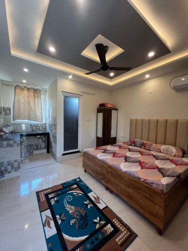 Postel nebo postele na pokoji v ubytování Anjali Home Stay