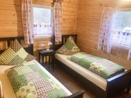 Ένα ή περισσότερα κρεβάτια σε δωμάτιο στο Lenerz Comfortable holiday residence
