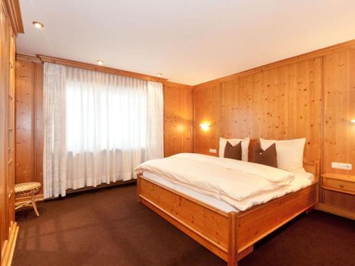 Un pat sau paturi într-o cameră la Hittenpichl "St Christoph"