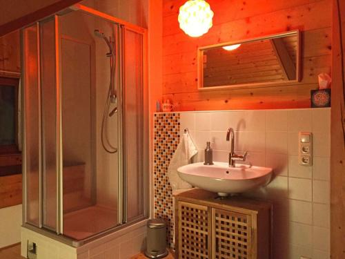 a bathroom with a sink and a shower at Cheese kitchen Bernbeuren in Bernbeuren