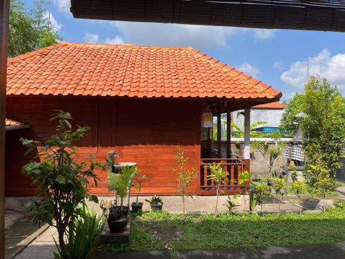Сад в Telagamas Guest House