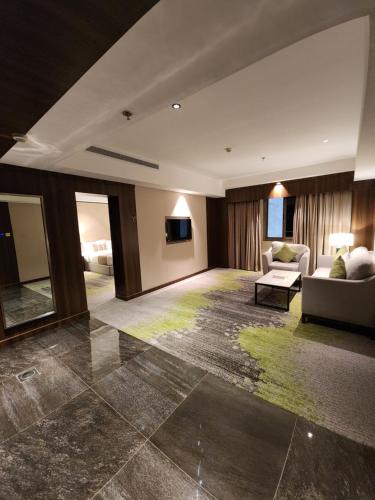 Televisyen dan/atau pusat hiburan di Azar hotel