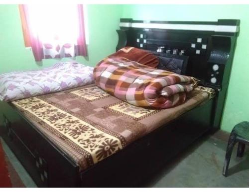 Posteľ alebo postele v izbe v ubytovaní Gidara Darshan Homestay, Gangnani