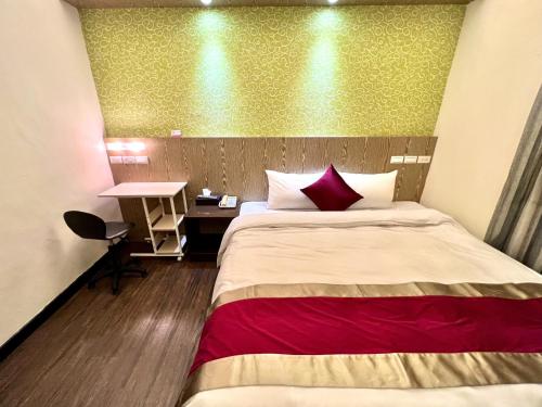 Postel nebo postele na pokoji v ubytování Zhao Lai Hotel