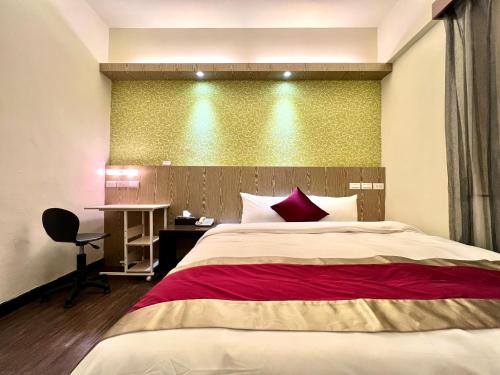 Postel nebo postele na pokoji v ubytování Zhao Lai Hotel