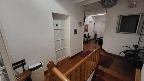 a room with a staircase and a stair case at La Casona Hospedaje in Lima