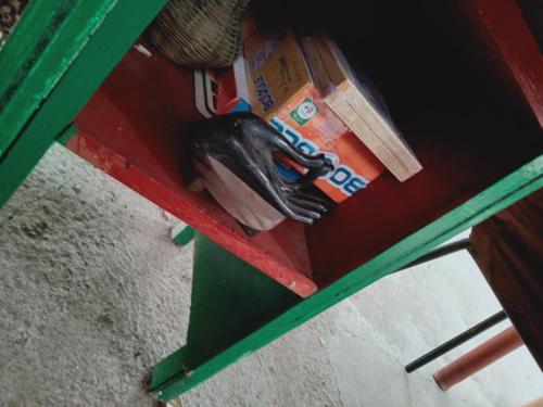 a green and red table with a pair of scissors at JUNGLE GYM LA UNION Prana fan kubo 2 pax in Rimus