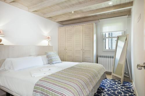 Posteľ alebo postele v izbe v ubytovaní Luderna - Apartamento Val de Ruda B26 des Garonets
