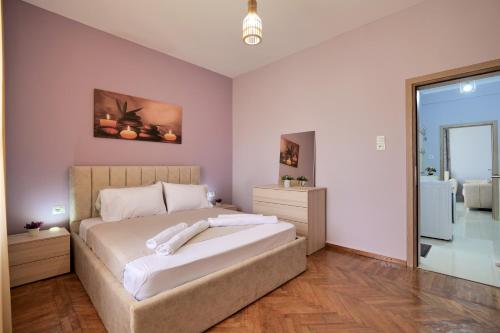 Postel nebo postele na pokoji v ubytování Elsa Apartment