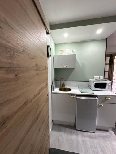 Photo de la galerie de l'établissement Studio Cosy, à Saint-Gilles