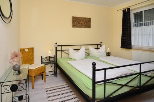 Giường trong phòng chung tại Schulstr 19 Zwergenhaus