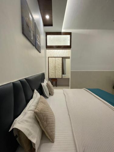 Katil atau katil-katil dalam bilik di Hotel Dileep