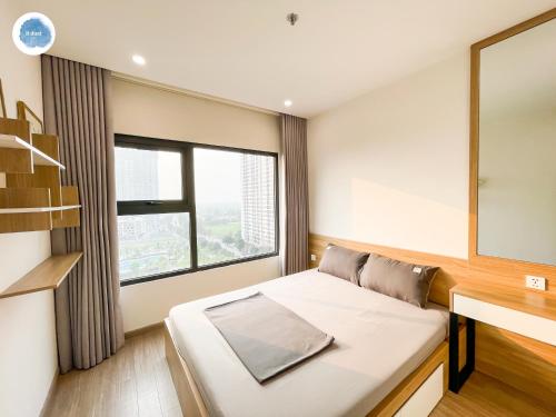 Ένα ή περισσότερα κρεβάτια σε δωμάτιο στο It Dust Homestay 6 - The Forest Apartment