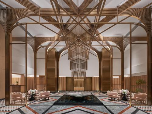 a rendering of a lobby with a large ceiling at Conrad Urumqi in Ürümqi
