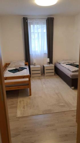 Cama ou camas em um quarto em Mimalou Apartment in Glauchau