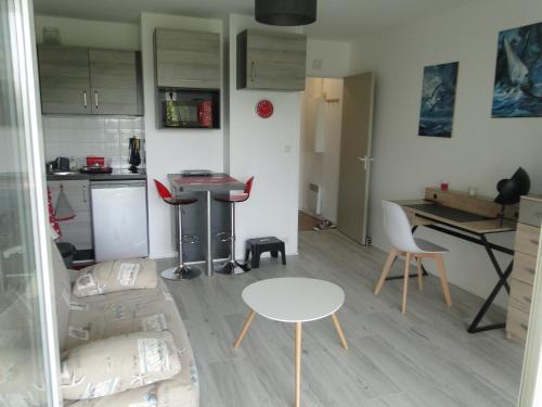 Η κουζίνα ή μικρή κουζίνα στο Magnifique studio à Aytré