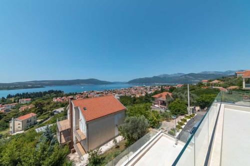 a view of a city from the roof of a building at MonteLux Mansion in Tivat