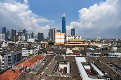 an overhead view of a city with tall buildings at hotel bintang in Kuala Lumpur