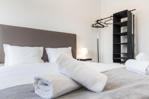Katil atau katil-katil dalam bilik di GuestReady - Spacious modern stay in Porto