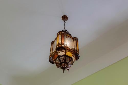 a chandelier hanging from a ceiling at Casa da Moura in Lagos