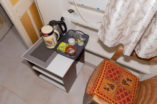 an overhead view of a table with medicines on it at Homestay Urmil Basant in Jaipur