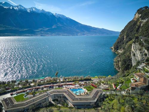 an aerial view of a lake with mountains at Hotel Atilius in Limone sul Garda