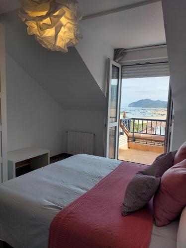 Postel nebo postele na pokoji v ubytování Playa Centro Piscina