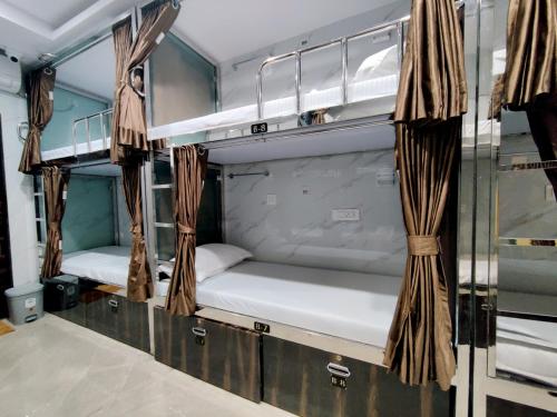 Postel nebo postele na pokoji v ubytování Hotel Comfy Inn