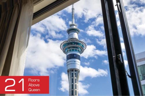 a view of the berlin tv tower from a window at Entire Apartment 21st Floor Queen Street in Auckland