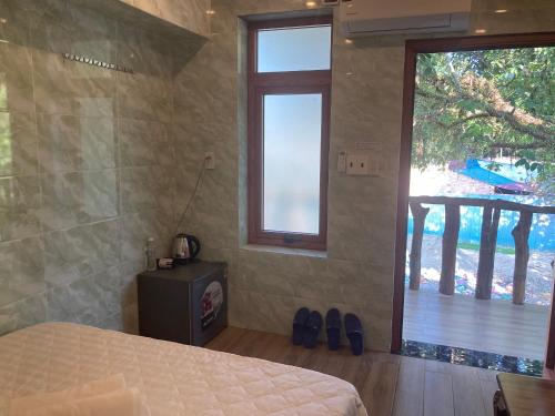 Cát Tiên Hotelにあるベッド