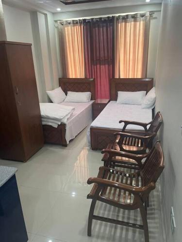Savul Inn Guest House - Faisal Town near Islamabad International Airport and Motorway