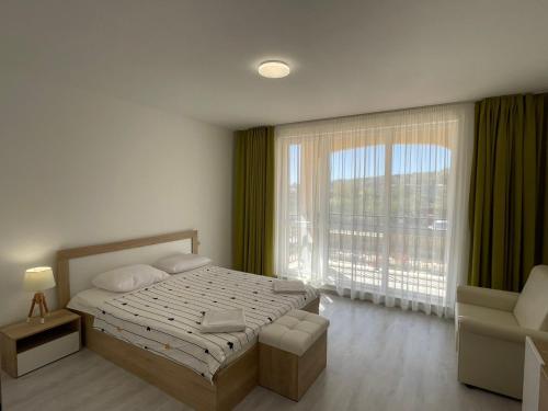 เตียงในห้องที่ Sun Residence -Byala SP apartments