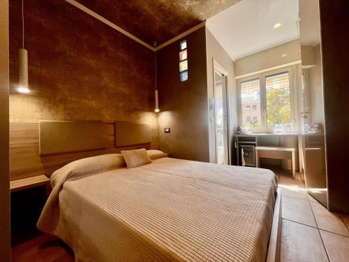 Postel nebo postele na pokoji v ubytování Marilena