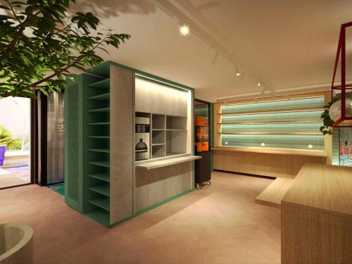 Cette chambre dispose d'une cuisine avec une grande fenêtre. dans l'établissement ibis Styles Bordeaux Centre Gare, à Bordeaux