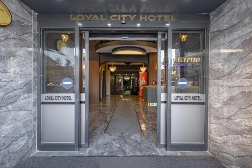 Certifikát, hodnocení, plakát nebo jiný dokument vystavený v ubytování BURSA LOYAL CiTY HOTEL