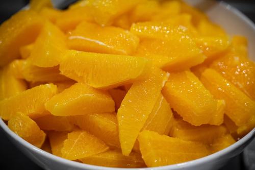 a bowl full of orange peel at Kyriad Prestige Saint-Malo in Saint Malo