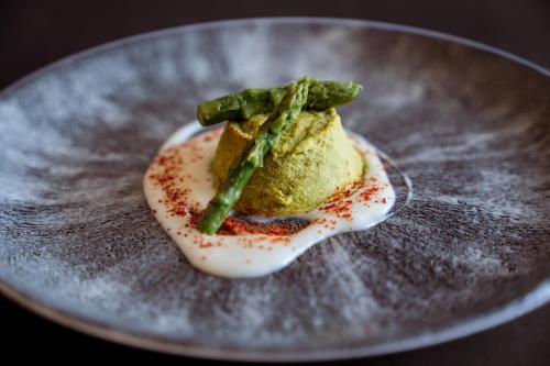 a plate with a dessert with asparagus on it at Villa Tuscolana in Frascati
